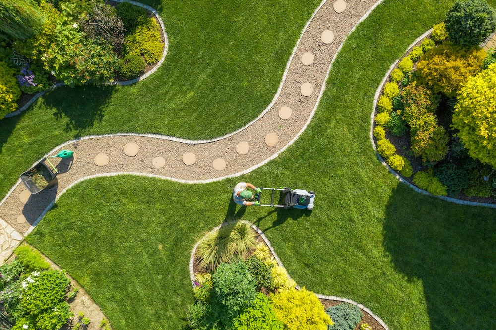 man mowing a lawn